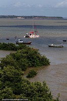Brazil Photo - Catamaran and other boats moored on the Bacanga River beside the bridge in Sao Luis.