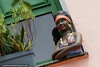 Brazil Photo - Attractive woman in summer clothes watches the street from her window in Sao Luis.