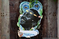 Abstract street art featuring a black woman in Sao Luis.