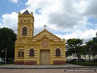Mustard colored church in Boa Vista, Paroquia Nossa Senhora Do Carmo. Brazil, South America.