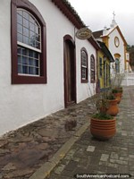 Pot plants, art shop, restaurant, church, Santo Antonio, Florianopolis. Brazil, South America.