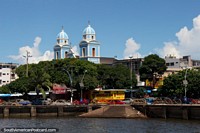 The 2 towers of the cathedral as seen from the wharf in Santarem. Brazil, South America.
