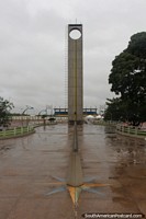The equator monument and line at the Equinocio (Marco Zero) in Macapa,  football stadium behind has the middle line on the equator also. Brazil, South America.