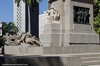 Monument of stone statues and a metal plaque in Rio de Janeiro. Brazil, South America.