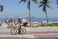 Looking across the road to the sea at Ipanema Beach in Rio de Janeiro. Brazil, South America.