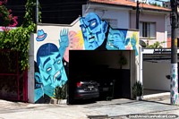 Larger version of Awesome street art around a garage for cars in Vila Madalena, Sao Paulo.