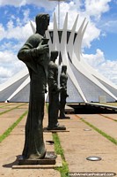 Another view of the Metropolitan Cathedral with a row of statues in front, Brasilia. Brazil, South America.