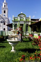 Cafe 17 in Joao Pessoa, historical green building and nice gardens and flowers. Brazil, South America.