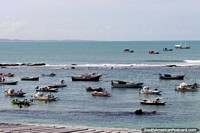 Fishing boats in the bay at Pipa Beach. Brazil, South America.