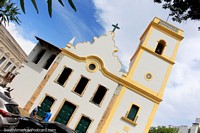 Larger version of Church Igreja Nuestra Senora da Apresentacao (1862) in Natal, yellow and white with a small clock on the bell-tower. 