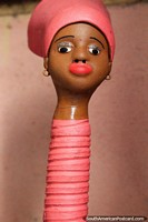 African female in pink with a long neck. Sao Luis is known for great arts and crafts. Brazil, South America.