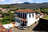 Brazil Photo - Foreground restaurant, distant church and mountains in Ouro Preto, a pretty location.