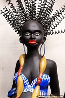 She has the hair, big round earrings and a large necklace, a beautiful figurine from Ouro Preto.
