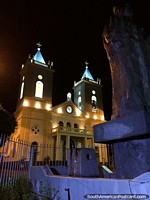 Matriz Church in Porto Velho at night, with 2 towers and a clock. Brazil, South America.