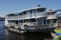 Larger version of Passenger ferries docked on the river at the port in Manaus.