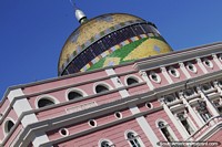 Dome in Brazilian colors and the pink facade of the Amazon Theater in Manaus. Brazil, South America.
