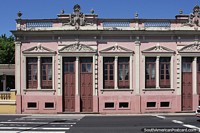 An old pink building with much detail in the design in Manaus. Brazil, South America.
