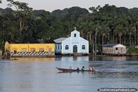 Light blue church on the edge of the Amazon River, east of Jutai.