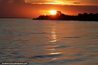 Glowing orange sunset across the Amazon River east of Amatari.