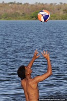 Ball sports in the cool waters of the Tocantins River at Fila Beach in Filadelfia.