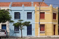 Brazil Photo - Colorful houses with wooden window shutters in Corumba.