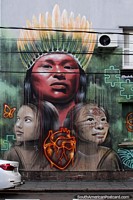 Indigenous man and 2 daughters, street art in Porto Alegre. Brazil, South America.