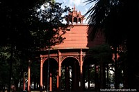 Plaza Piratinino de Almeida with a huge open red structure (water system) in Pelotas.