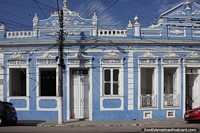 Blue building with white art-deco in Pelotas, a great city for art-decoration.