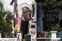 Urban street art featuring a woman and Nelson Mandela in Pelotas.