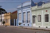 Cobblestone street of colorful art-deco houses in Pelotas.