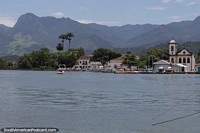 Amazing mountain backdrop and the attractive waterfront and church area in Paraty.