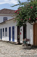 Bicycle outside a shop on a typical cobblestone street in Paraty.
