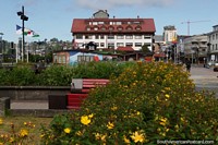 Park area beside the plaza with a hotel at the back in Puerto Montt.