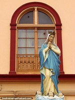 Larger version of Religious statue with 3 angels at her feet at Casa de la Divina Providencia in La Serena.