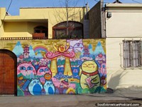 Wall mural of many cats in front of a house in Iquique, very colorful. Chile, South America.