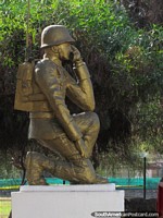 Gold monument of a military man at the army base in Iquique. Chile, South America.