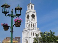 Chile Photo - Flower pots and lamps and the clock tower at Plaza Prat, Iquique.