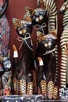 A group of wooden cats for sale at the arts and crafts market in Valdivia. Chile, South America.