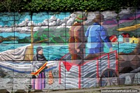 Arte de rua de 2 pessoas em um cavalo e carreta e mulher que anda em Porto Montt. Chile, América do Sul.