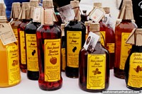 Chile Photo - Fruit liqueurs of different flavors produced in nearby Frutillar at the Gourmet Food Fair in Puerto Varas.