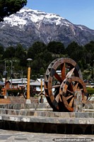 Water wheel in the Plaza de Armas in Futaleufu, the main square. Chile, South America.