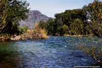 Chile Photo - The Espolon River runs behind the town in Futaleufu and is used for less advanced activities.