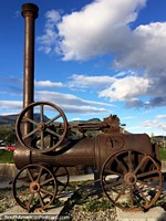 An old steam train on display near the river in Cochrane. Chile, South America.