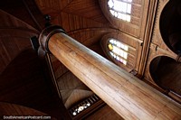 Wooden columns, archways and windows inside San Francisco Temple in Castro. Chile, South America.