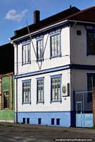 Well-kept building with a tidy facade of blue and white in Punta Arenas, Lions Club. Chile, South America.