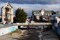 Houses, buildings and bridges around the river in Punta Arenas. Chile, South America.