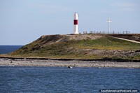 Larger version of Light beacon and cross on the point close to Porvenir in the Tierra del Fuego.
