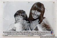 Photo of Selknam people who were the original inhabitants of the Tierra del Fuego, woman and child. Chile, South America.