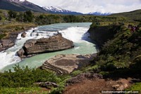 Looking upriver at the amazing Paine River Waterfall at Torres del Paine. Chile, South America.