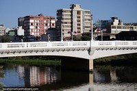 Chile Photo - The bridges over the estuary are blended nicely within the city landscape in Vina del Mar.
